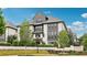 Exterior view of the 'Serenade' community, showcasing its elegant architecture and landscaping at 215 Britten Pass, Alpharetta, GA 30009