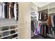 Organized walk-in closet with custom shelving, drawers, and ample hanging space at 215 Britten Pass, Alpharetta, GA 30009