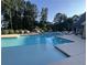 Beautiful community pool with multiple lounge areas, perfect for relaxation and recreation at 215 Britten Pass, Alpharetta, GA 30009