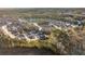 An elevated perspective of the community showcasing the arrangement of homes, green spaces and landscape at 4058 Rosebay Way, Conyers, GA 30094
