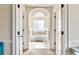 Hallway view of the bath with a tub at 4058 Rosebay Way, Conyers, GA 30094