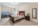 Bedroom featuring carpet, neutral colored walls, and natural lighting at 4058 Rosebay Way, Conyers, GA 30094