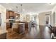 Bright kitchen showcases granite countertops, dual islands, stainless appliances, and hardwood flooring at 4058 Rosebay Way, Conyers, GA 30094