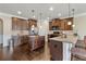 Spacious kitchen featuring granite countertops, stainless steel appliances, and rich wood cabinetry at 4058 Rosebay Way, Conyers, GA 30094