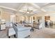 Spacious living room with a coffered ceiling, neutral decor, and open floor plan at 4058 Rosebay Way, Conyers, GA 30094