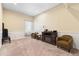Living room with a fireplace and two armchairs at 4058 Rosebay Way, Conyers, GA 30094
