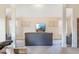 Elegant living room with neutral palette, large windows, and cozy seating arrangement at 4058 Rosebay Way, Conyers, GA 30094
