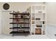 Display shelving units that provide lots of space for decor, books, and storing other items at 4058 Rosebay Way, Conyers, GA 30094