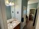 Hall bathroom featuring a granite countertop and a door to a bedroom at 5403 Timber Wild Ln, Buford, GA 30518