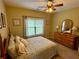 Bright bedroom with a large window and traditional decor at 5403 Timber Wild Ln, Buford, GA 30518