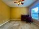 This bedroom has carpet, chair rail, and an office desk at 5403 Timber Wild Ln, Buford, GA 30518