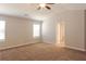 Neutral bedroom with ensuite bathroom and high ceilings at 89 Citadel Dr, Hampton, GA 30228