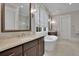 Elegant bathroom with soaking tub, double vanity, and natural light at 125 Windy Pines Pass, Roswell, GA 30075