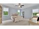 Comfortable bedroom featuring lots of natural light and neutral decor at 125 Windy Pines Pass, Roswell, GA 30075