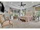 Relax in this luxurious Primary suite with seating area and natural light at 125 Windy Pines Pass, Roswell, GA 30075