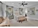 Relax in this luxurious Primary suite with seating area and natural light at 125 Windy Pines Pass, Roswell, GA 30075