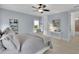 Relaxing bedroom featuring lots of natural light and neutral decor at 125 Windy Pines Pass, Roswell, GA 30075