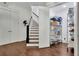 Entryway with hardwood floors, staircase and hall pantry at 125 Windy Pines Pass, Roswell, GA 30075
