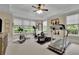 Home gym filled with exercise equipment and natural light, creating an inviting workout space at 125 Windy Pines Pass, Roswell, GA 30075