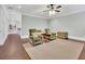Spacious living area featuring neutral decor and hardwood floors at 125 Windy Pines Pass, Roswell, GA 30075