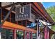 Exterior of Loyal Tavern with outdoor patio and ceiling fans at 125 Windy Pines Pass, Roswell, GA 30075