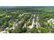 Aerial view of the neighborhood with lush trees and a marker showing the property's approximate location at 1720 Greystone Trce, Conyers, GA 30013