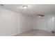 Finished basement space with carpeting, ceiling fan, and closet storage at 1720 Greystone Trce, Conyers, GA 30013