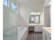 Luxurious bathroom with soaking tub, walk-in shower, and dual vanities at 1720 Greystone Trce, Conyers, GA 30013
