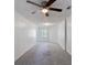 Upstairs bonus room with neutral carpet and a ceiling fan at 1720 Greystone Trce, Conyers, GA 30013