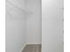 Walk-in closet with shelving, providing ample storage at 1720 Greystone Trce, Conyers, GA 30013
