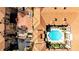 Aerial view showcasing the condo community layout, featuring a central pool area and terracotta rooftops at 955 Juniper Ne St # 2322, Atlanta, GA 30309