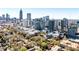 Scenic aerial view of the city skyline with residential buildings, lush trees, and striking architecture at 955 Juniper Ne St # 2322, Atlanta, GA 30309