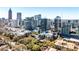 City skyline aerial view with lush green trees, apartments, and stunning architectural design at 955 Juniper Ne St # 2322, Atlanta, GA 30309