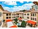 Aerial view of Palazzo Bocce courtyard with fountain, red canopies, and landscaping at 955 Juniper Ne St # 2322, Atlanta, GA 30309