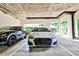 Secured garage with two parked cars and visible building architecture at 955 Juniper Ne St # 2322, Atlanta, GA 30309
