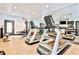 Well-equipped gym with modern exercise machines and mirrored walls at 955 Juniper Ne St # 2322, Atlanta, GA 30309