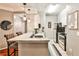 Bright kitchen features a granite countertop, stylish pendant lighting, and stainless steel appliances at 955 Juniper Ne St # 2322, Atlanta, GA 30309