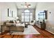 Living room showcasing hardwood floors, high ceilings, and modern decor at 955 Juniper Ne St # 2322, Atlanta, GA 30309