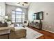 Cozy living room with hardwood floors, neutral tones, and natural light at 955 Juniper Ne St # 2322, Atlanta, GA 30309