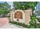 Entrance sign for Tuscany Condominiums with well-maintained landscaping and greenery at 955 Juniper Ne St # 2322, Atlanta, GA 30309