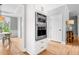 Modern kitchen with stainless steel ovens and a view of the breakfast nook and dining area at 4235 Night Sky Ln, Cumming, GA 30041