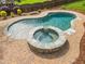 The aerial view showcases a custom pool with an attached spa and meticulously designed patio at 4235 Night Sky Ln, Cumming, GA 30041