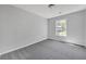 Cozy bedroom with carpet, a window providing natural light, and neutral paint, perfect for relaxation at 4336 Southvale Dr, Decatur, GA 30034