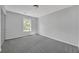 Serene bedroom with soft carpet, natural light from a window, and a closet, promoting a calming atmosphere at 4336 Southvale Dr, Decatur, GA 30034