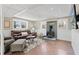 Cozy basement living area with a wood-burning stove, comfortable seating, and neutral color scheme at 6265 Reives Rd, Cumming, GA 30041