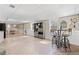 Spacious finished basement featuring tile flooring, high ceilings, and room for seating and entertaining at 6265 Reives Rd, Cumming, GA 30041