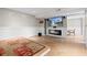 Spacious basement with a fireplace, TV, and neutral decor at 6265 Reives Rd, Cumming, GA 30041