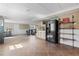 Entertainer's basement with a kitchenette, bar and a lounge area at 6265 Reives Rd, Cumming, GA 30041