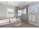 This bathroom includes a separate shower and tub perfect for relaxation at 6265 Reives Rd, Cumming, GA 30041