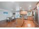 Charming kitchen boasts granite countertops, stainless steel appliances, and an island at 6265 Reives Rd, Cumming, GA 30041